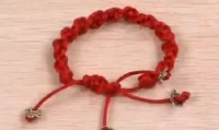 红绳手链珠子与珠子之间该怎么扣节？