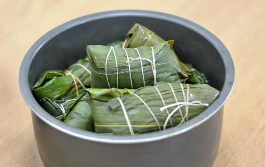 煮粽子用高压锅好还是用普通的锅好(用高压锅煮粽子选择哪个模式)